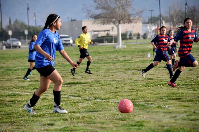 California United’s U-12 Fatima Alvarado, mid-fielder, scans the field as she looks to set up the play against USA last weekend. California United defeated USA 8-1. Photo courtesy Evelia Hernandez.