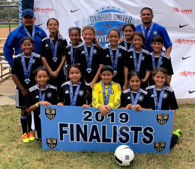 Pictured above is the California United FC 2008 Girls Soccer Team which finished as finalists in the Oxnard United Invitational this past week. Top Row left to right, Assistant Coach Aciano Mendez, Joelle Rodriguez, Lizbeth Mendez, Valerie Rubio, Jazleen Vaca, Victoria Piña, Alondra Leon, Head Coach David Vaca, Nathalia Orosco, Fiona Cabral Bottom Row Left to right Danna Castillo, Anel Castillo, Delila Ramirez, Sara Dias, and Leanna Villa. Not pictured Assistant Coach John Cabral.