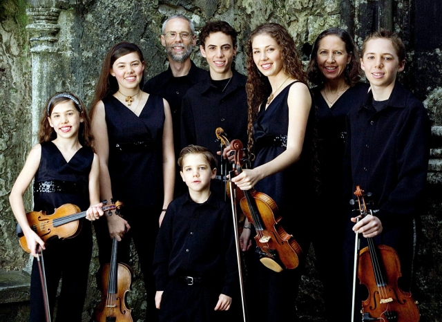 Shown is Celtic Spring: Celtic Spring is: Elizabeth (23)-fiddle, step dance, octave fiddle, Deirdre (21)-fiddle, step dance, vocal, Sean (19)-octave mandolin, fiddle, step dance, octave fiddle, Patrick (17)-octave fiddle, fiddle, step dance, Maire (13)-fiddle, step dance, Aidan (8)-step dance, fiddle, Mary (mom) keyboards, Greg(dad)-bodhran, percussion.
