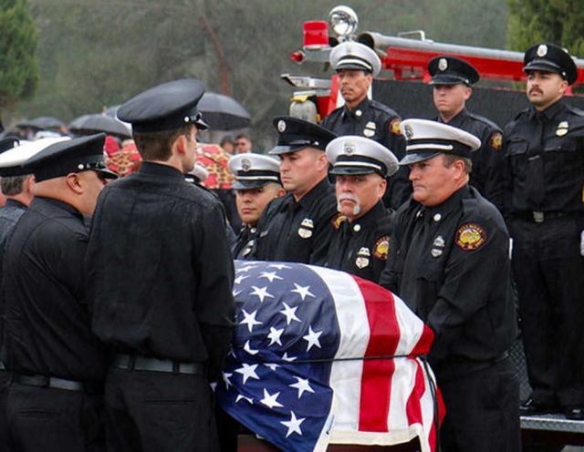 Chief Landeros’ fellow firefighters carry him to his final rest. Photos courtesy Sebastian Ramirez.