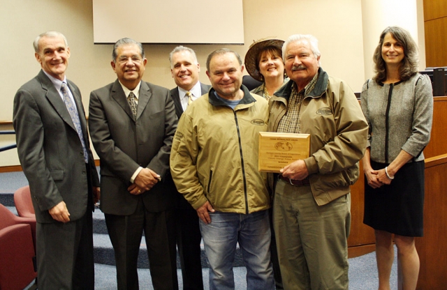 Jim Harrison and Ralph Harrison of Harrison Industries accept the County Climate Award from Ventura County Supervisors (from left) Steve Bennett, John Zaragosa, Peter Foy, Kathy Long and Linda Parks.