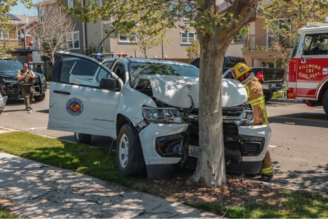 On Wednesday, April 10, at 1:21 p.m., Fillmore Police Department, Fillmore City Fire, and AMR Paramedics responded to a reported truck in a tree on River Street and Willow Street. Upon arrival, deputies found a city of Fillmore work truck crashed into a tree, as well as a parked vehicle that had been side-swiped. The truck's occupant was a Fillmore city employee who was treated and transported to the Santa Paula Hospital, condition unknown. Cause of the crash is under investigation. Photo credit Angel Esquivel-Firephoto_91.