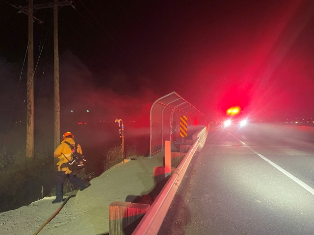 On Sunday, December 10, at 9:12 p.m., Fillmore Fire Department and Ventura County Fire were dispatched to a reported brush fire on A Street bridge at the Santa Clara River bottom. Arriving firefighters located a 30x30 foot homeless encampment fire caused by dwellers in the area. Photo credit Angel Esquivel-AE News.