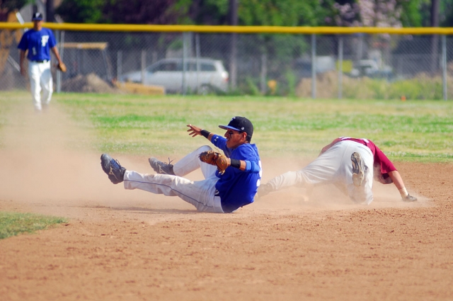 Raul Ramierz waits for the call from the umpire on the tag he made at second base. He was out!