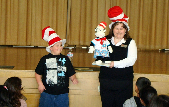 Mrs. Gunter and her son Austin read The Lorax by Dr. Seuss to the second graders in honor of Dr. Seuss’ birthday. 