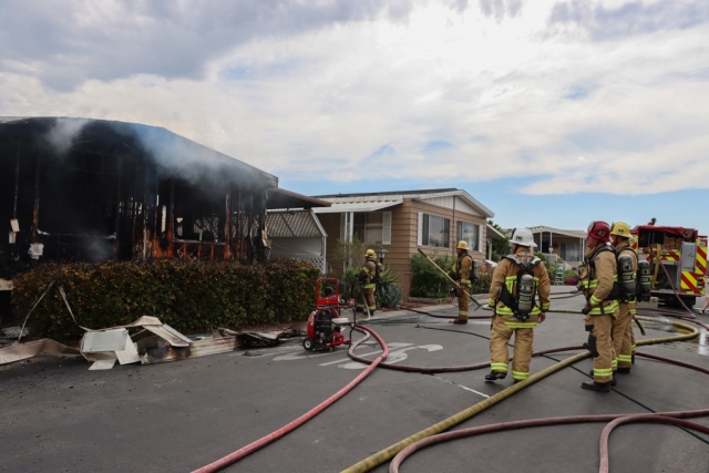 Fillmore City Fire Department and the Ventura County Fire Department responded to a reported structure fire at 250 E. Telegraph Road at the El Dorado Mobile Home Estates on Sunday, July 23, 2023, at 3:45 p.m. When firefighters arrived, they encountered a mobile home fully involved in flames. Neighbors were spraying water with garden hoses to stop the fire from spreading to surrounding residences. Fillmore Fire Chief Keith Gurrola said the fire’s rapid spread within the unit was due to the heat; in the city on Sunday, the high temperature was 91 degrees. Due to the fire investigator’s determination that the incident was suspicious in nature, Fillmore City Fire dispatched the Fillmore Police Department to assist with the investigation while fire crews were on the site. A 27-year-old woman who lives at the home was arrested by deputies based on their investigation at the scene. The female subject was taken into custody for PC 451-Arson and was booked at the Pre-Trial Detention Facility, said Fillmore Police Chief Eduardo Malagon. Photo credit Angel Esquivel-AE News.