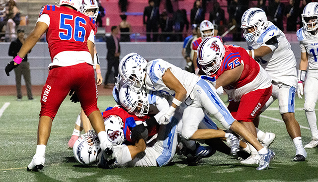 On Friday, October 2, at 7 p.m., Flashes Varsity Football traveled to San Marcos High School for an away game. The Flashes played well and defeated San Marcos 51-15. JV team also defeated San Marcos, 21-14. This week, FHS will travel to Hueneme High School. JV game begins at 4 p.m., followed by the Varsity game at 7 p.m. Above, a group of Flashes Varsity players take down a San Marcos player. Below, Flashes Varsity No. 2 runs into the end zone, scoring for the Flashes during Friday night’s game. FHS Varsity is 4-2 overall so far this season. Photo by Crystal Gurrola.