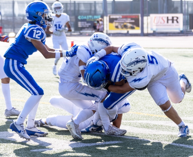 Above is a Flashes JV making a tackle during their game against Burbank last Friday. Photo credit Crystal Gurrola. 