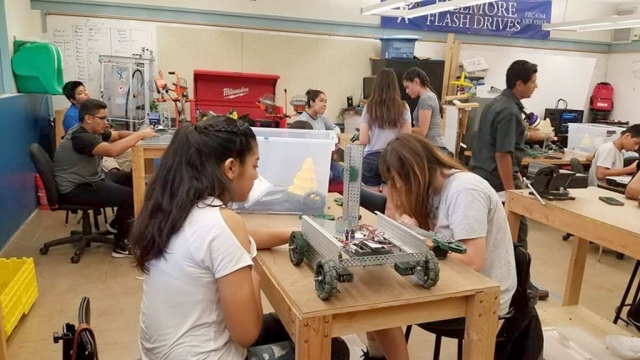 Pictured above are students tinkering away at the FHS Robotics Summer Camp which was held at Fillmore High this summer. Students were able to earn 5 credits for the class, work with equipment and technology as well as learn a new set of skills. The FHS Robotics Summer Camp was just one of three camps offered this year at FHS. Students are also enrolled in a Medical Terminology Camp and Video Productions Camp.