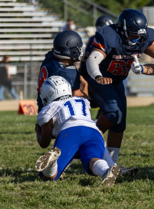 On Friday, September 15, Fillmore Flashes JV & Varsity took on and defeated Chatsworth High School. Varsity defeated Chatsworth 34–21. Flashes are 2–3 so far this season. This Friday, September 22, the Flashes will play away at Don Lugo at 7p.m. Pictured right is Flashes JV #17 making the tackle in last Friday’s game against Chatsworth. Photo credit Crystal Gurrola. Below is Varsity’s #3 making his move past the Chatsworth defense while teammates help clear his path. Photo credit Crystal Gurrola. 