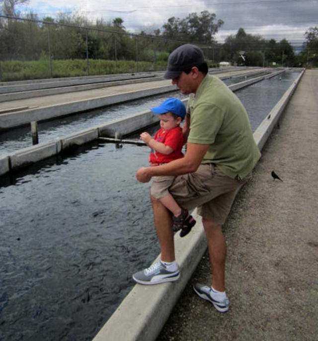 Cap Peterson's son Jason at the Fillmore Fish Hatchery with his son Jimmy.