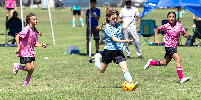 Pictured are scenes from Fillmore AYSO games, including the 12U Blue Thunder vs. Pink Team matchup, where the Pink Team earned a 2-1 victory. Also pictured is the 6U Hulks vs. Blue Thunder game, with Blue Thunder winning (no official score is kept for this age group). Photo by Crystal Gurrola.
