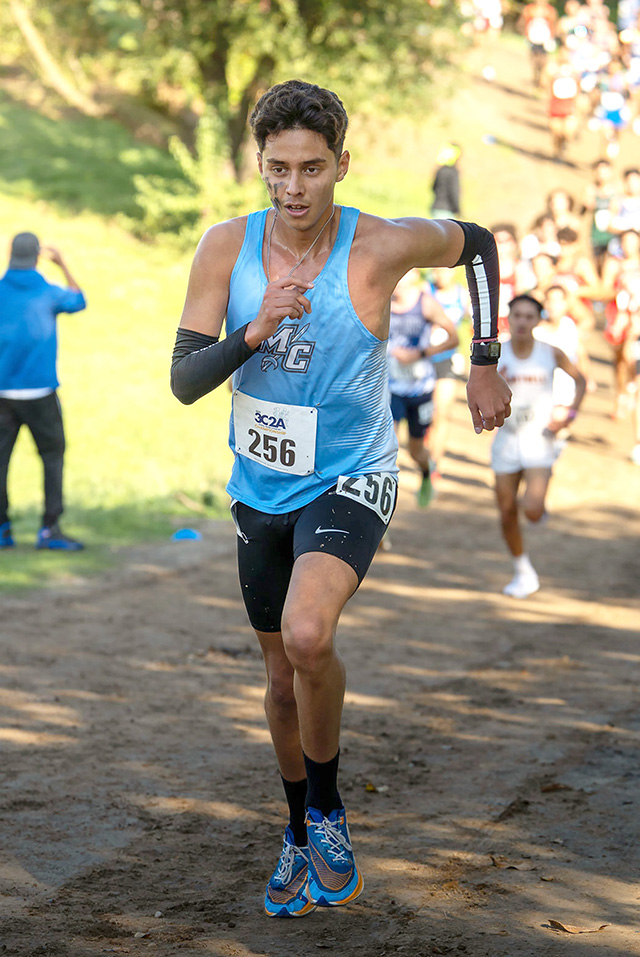 Pictured above is FHS Alumni Angel Garcia running for Moorpark College in the California Community College Athletic Association State Meet (3C2A) at Woodward Park in Fresno, California. Photo credit Jonathan Castro of Moorpark.