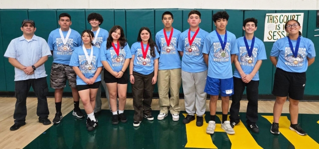 On Friday, April 4th, the Fillmore Middle School Wrestling Team competed at the Ventura County Middle School Wrestling Championships and claimed victory. Pictured is the team L-R: Coach Michael Torres, Sebastian Davila, Sophia Valdovinos, Damian Garcia, Jaysa Martinez-Bernal, Tania Vazquez, Tyson Garcia, Kobe Avila, Cayden Balades, Elijah Sandoval, Sophia Rivera. Not pictured: Barker Blackshear, Abraham Castorena, Torrey Morales, Christopher Padilla. Photo credit Emma Torres. Photo credit FMS Head Coach Michael Torres.