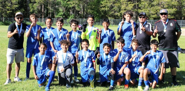 On Saturday and Sunday, June 14th and 15th, Fillmore’s California United FC U12 Boys team earned the Emerald Championship title at the prestigious CUFA “Come Up For Air” Summer Tournament. Top left: Coach Octavio Mejia, Jencarlo Mendez, Julian Martinez, Matt Duenas, Matt Flores, Obie Qualls, Julio Vargas, Joan Mendez, Assistant Coach Aciano Mendez, and Assistant Coach Victor Magana. Bottum left: Ezel Montes, Aydenn Martinez, Ethan Lomeli, Joseph Lomeli, Jaxon Cervantes, Julian Morones, and Vicente Magana. Photo credit Ricky Cervantes.