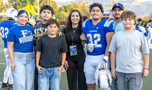 The Fillmore Flashes football team celebrated Senior Night on Friday, September 18, during its home game against Carpinteria High School. The evening honored Fillmore High School seniors from the football, cheer, and band programs who will graduate this year. Pictured are FHS seniors representing the 2027 football, cheer, and band squads. FHS JV defeated Carpinteria 42-14, while the Varsity team earned a 48-0 victory. Fillmore has a bye this week and will return to action on Friday, October 2, with an away game against San Marcos High School. Photo credit Crystal Gurrola.