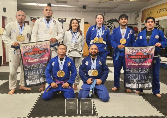 On Sunday, April 27th, students of Perce’s Kenpo Karate Studio in Fillmore competed at the Grappling X West Coast Jiu-Jitsu Championships in Westlake and competed against field 80 schools. Pictured above are those who competed. Standing (l-r): Miguel Rangel, Jose Ramirez, Dyana Ramirez, Emma Lopez, Raul Santa Rosa, and Prof. Michael Torres. Kneeling (l-r): Karl Blanco and Leo Zendejas. Photo credit Michael Torres.