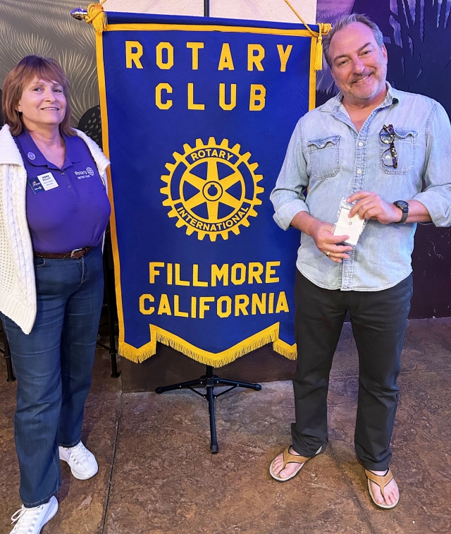 Pictured above is Fillmore Rotary Club President Anna Reilley presenting member Greg Agostinelli with a Rotarian of the Month pin at the Wednesday, March 27th meeting. Photo credit Martha Richardson.