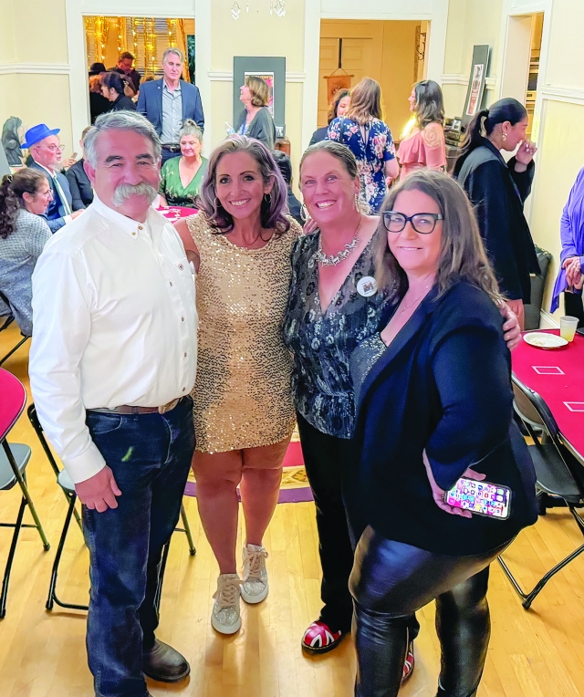 On Friday, May 10, 2024, the Fillmore Women’s Service Club hosted the Susan Banks Memorial Fundraiser in order to raise scholarships for Fillmore High School students. Pictured above is Fillmore Chief Keith Gurrola, Elect 2nd Vice Ways and Means FWSC Brandy Hollis, Current Ways and Means FWSC Taurie Banks (Susan Banks’ daughter), and Danielle Quintana, Current President FWSC, at this year’s event. 