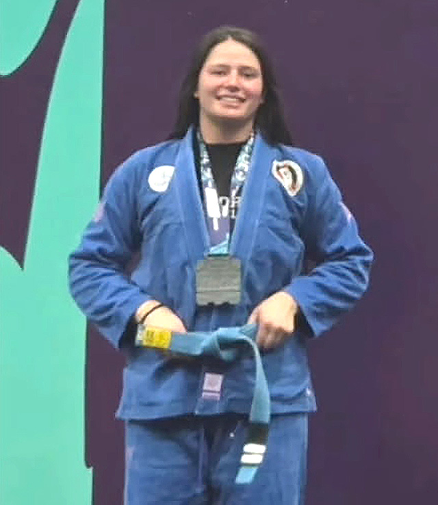 On September 26 and 27, Fillmore’s Perce’s Kenpo Karate Jiu-Jitsu team competed in the Jiu Jitsu World League Pan American Championship at the Long Beach Sports Arena in both the youth and adult divisions. Above is Emma Lopez earned a silver medal at the JJW League Pan American Championship. Photo credit Michael Torres.