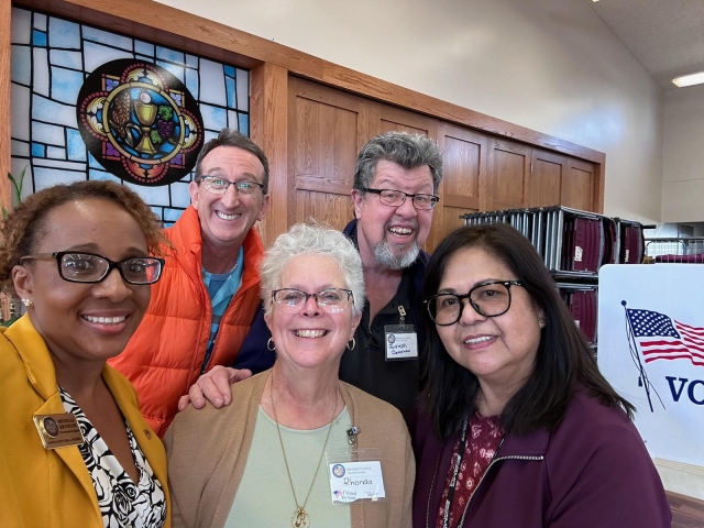 On Tuesday, February 27, Michelle Ascencion visited the Fillmore Voting Center during the elections at the St Francis of Assisi Catholic Church, which is a Ventura County Voting center. Pictured front row (l-r) are Michelle Ascencion (Clerk-Recorder & Registrar of Voters Ventura County Elections Division), Rhonda Taylor, and Aleli Alviz. Second row (l-r) are Brian Glenn, Joe Donovan, and volunteer election workers.