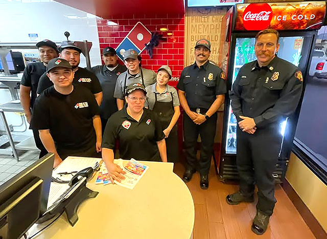 On Wednesday, October 7, in recognition of Fire Prevention Month, the Fillmore Fire Department partnered with Fillmore Domino’s and the National Fire Protection Association for nine pizza deliveries with a life-saving message. During the deliveries, firefighters checked smoke alarms, installed working alarms in one home, and corrected an improperly installed alarm in another. Photo credit Angel Esquivel.