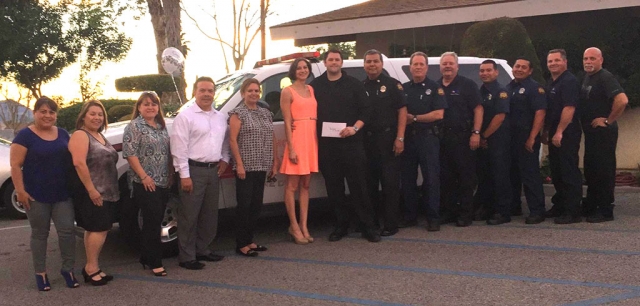 Chad Panke, center, has been named Fillmore Fire Fighter of the Year.