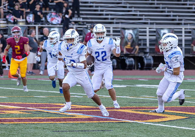 On Friday, August 21, Fillmore Flashes Varsity traveled to take on La Cañada High School in their season opener. Unfortunately, the Flashes fell short, with a final score of 22–31. The photo above and inset are from the Flashes Varsity game this past Friday. Photo credit Crystal Gurrola.