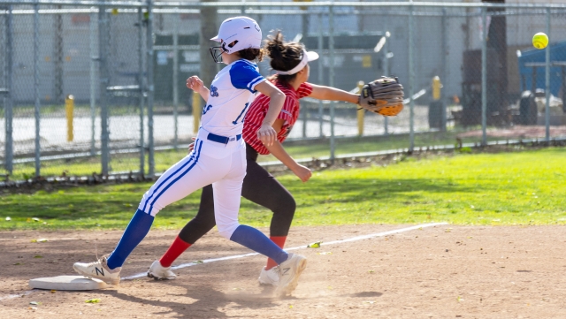 On Tuesday, April 1, Fillmore High Softball hosted Carpinteria High. Pictured above is a Flashes Varsity player advancing to 3rd base as Carpinteria tries to make the play. Inset, Flashes Varsity trying to get the out at 2nd base as the Carpinteria player slides in. Final score, Flashes 19 – Carpinteria 0 (https://www.maxpreps.com/ca/fillmore/fillmore-flashes/softball/schedule/). Photo credit Crystal Gurrola. 