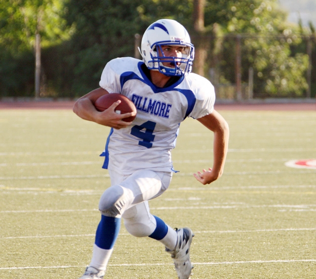 Collin Farrar #4 runs the ball for a touchdown. Sammy Orozco also had a touchdown. Fillmore won 21-16.