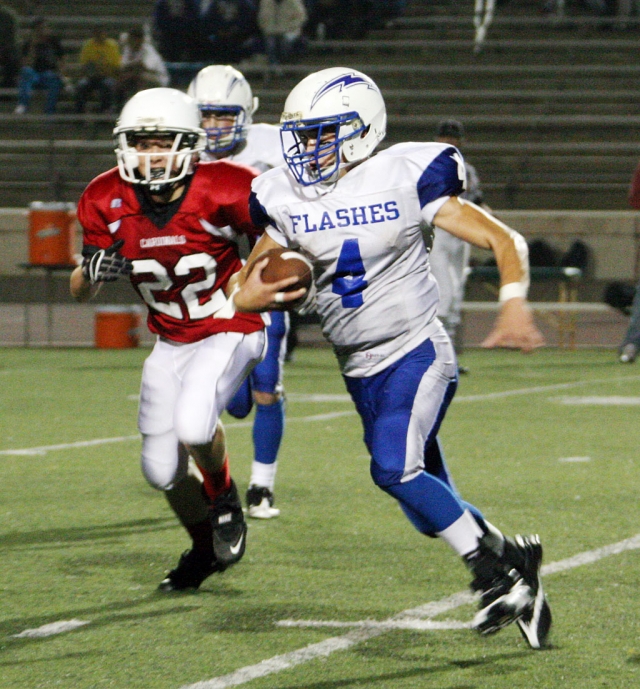 Jacob Hernandez #4 gains a couple of yards against Bishop Diego last Friday night.