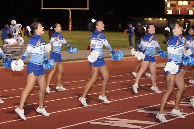 F.H.S. Varsity cheerleaders kept the crowd busy during the game against Carpinteria.