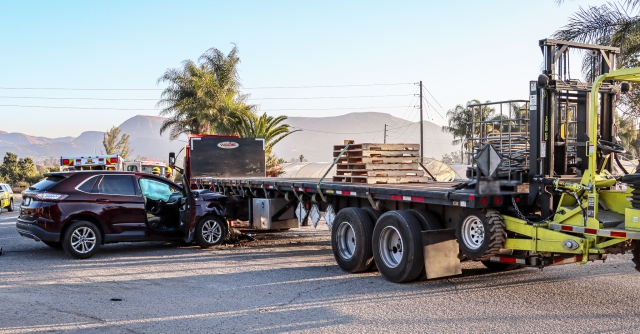 On Monday, December 9th, 3:48 p.m., the Ventura County Fire Department, AMR Paramedics, and California Highway Patrol were on-scene investigating a two-vehicle crash on Old Telegraph Road and Highway 126. Involved vehicles were a Ford Edge SUV and a semi-truck trailer. According to CHP, the SUV collided with the semi-trailer, causing the semi’s gas tank to crack open and dump roughly 75 gallons of diesel on the road. The SUV driver was treated and taken to Ventura County Medical Center where her condition is unknown. CHP remained on-scene for several hours until the road was cleared. Cause of the crash is under investigation. Photo credit Angel Esquivel. 
