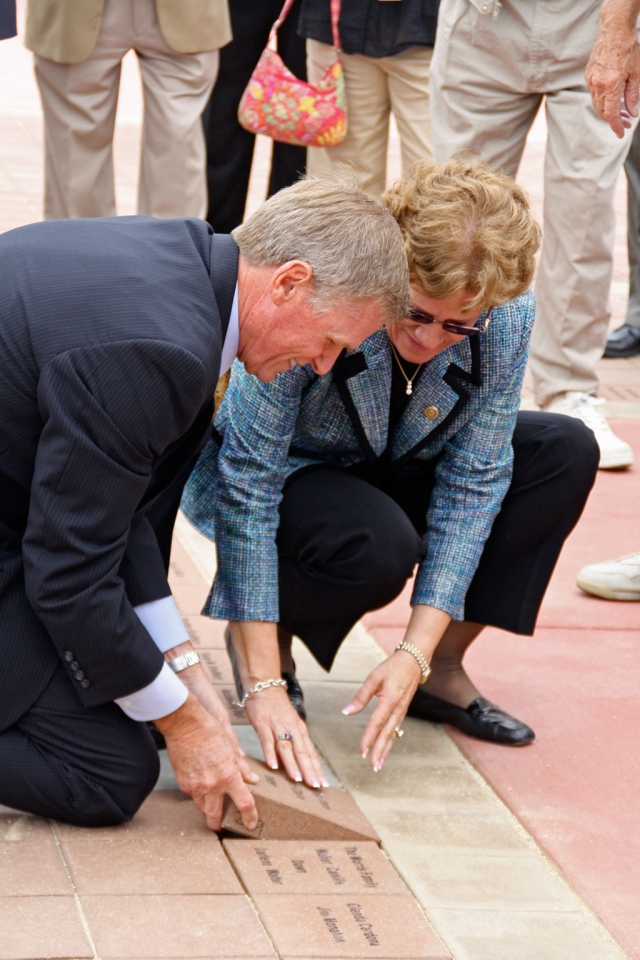 Greg Totten and Sue Chadwick installing a paving brick at the Ventura County Fairgrounds. (July 2011)
