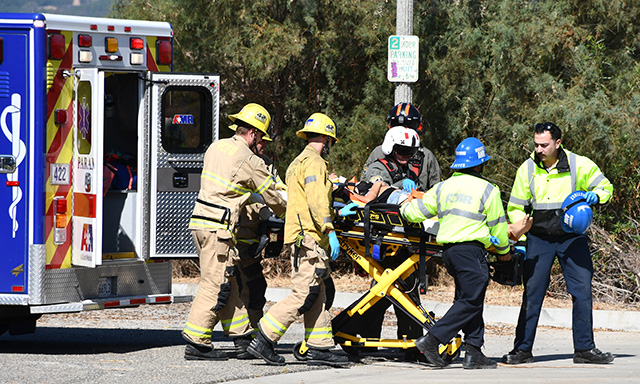 On Thursday, September 3, at approximately 9:47 a.m., the Ventura County Fire Department, AMR Paramedics, and the California Highway Patrol were dispatched to a traffic collision in the 3500 block of Grimes Canyon Road. According to CHP, the incident involved a blue sedan that struck an embankment and rolled over. Due to the driver’s injuries, a helicopter was requested. The patient was transported to the nearest helistop, where Copter 9 airlifted the patient and transported them to a local hospital.  Southbound lanes of Grimes Canyon Road were temporarily shut down while emergency crews operated at the scene. A tow truck was requested to remove the vehicle. The cause of the collision is under investigation. Photo credit Angel Esquivel.