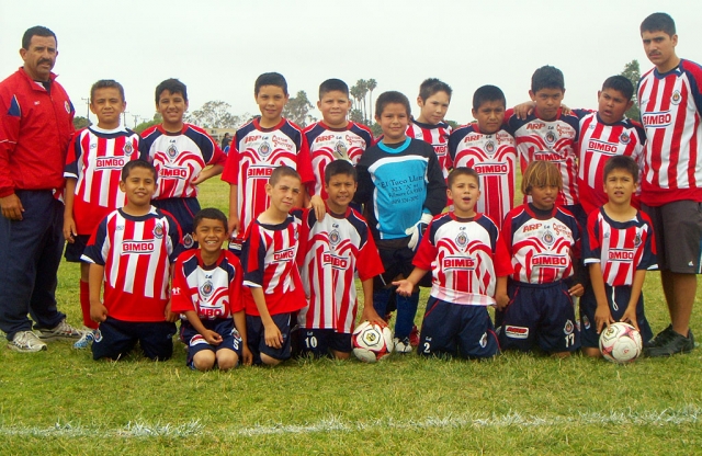 On Saturday, June 29th “CHIVAS FILLMORE” a youth soccer team took 2nd place in the spring season soccer fi nals. The players are between the ages of 9 & 10. Congratulations kids. Pictured (l-r) top: Trinidad Zavala (head coach), Angel Acosta, Emilio Manzano, Mathew Fletes, Abelardo Gaitan, Josue Morga, Efren Carbajal, Richard Estrella, Felix Tinoco, Fernando Gallardo, Javier Candelario (coach assistant). Bottom (l-r): Jesse Ballesteros, Yohan Medina, Luis Ruiz, Ricky Lomeli, Christian Candelario, Marcos Savala, Anthony Castaneda, Enrique Gutierrez(missing).