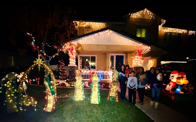 Pictured are this year’s Holiday Yard of the Year winners: (l-r) Annette Cardona, Kamrie Cardona, Noah Halcon, Ari Larson of Fillmore Civic Pride, Brittany Halcon and Alani Halcon.