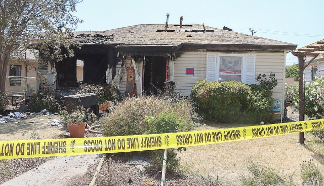 On Tuesday, June 24th, at 8:16am Fillmore Police and Fire, along with VC Fire Department responded to a reported house fire on Mountain View Street. Upon arrival, authorities found the house fully engulfed in flames and Fillmore resident Brandy Hollis in the backyard. With help from surrounding area police arrested the suspect and escorted her off the property. Crews responded quickly and were about to extinguish the fire, causing major damage to the residence and also damages to neighboring residences. Photo credit Angel Esquivel. 