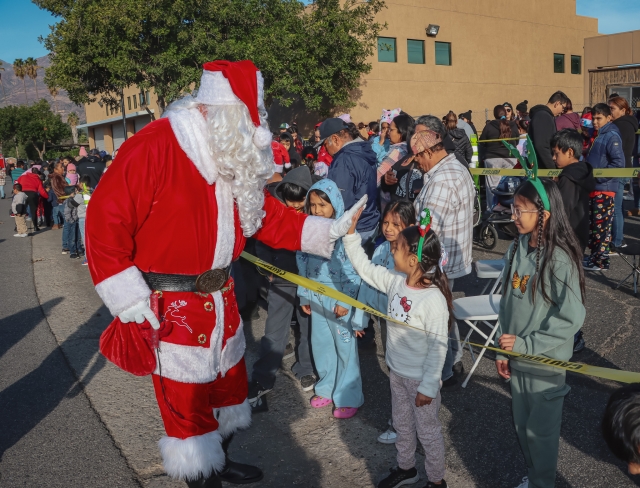 On Saturday morning, December 14, 2024, Fillmore residents lined up at the Fillmore Fire Station for the Annual Toy Giveaway. Each child took a picture with Santa Claus and received a new toy, book, new coat and socks. Cotton Candy and popcorn were also handed out. The children and their families were able to visit with first responders and learn safety tips while enjoying the event. Photo credit Angel Esquivel
