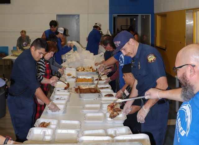 On Sunday, December 3, the Fillmore Fire Foundation kicked off their Holiday Toy Drive by hosting their annual BBQ Chicken Dinner Fundraiser to collect donations that are used to purchase hundreds of toys for children in the Fillmore/Piru area. From 5pm to 7pm folks were able to swing by the Fillmore High School cafeteria in the horseshoe area and pick up their meal. A complete chicken dinner meal was prepared for anyone wanting to donate $15 or a brand-new toy valued at $15 or more, to be given away at the Community Holiday Giveaway event to be held December 16, 2023.Photo credit Angel Esquivel-AE News.