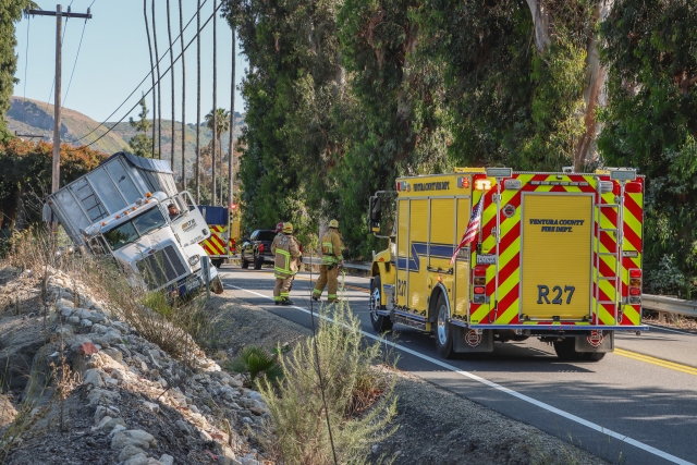 On Thursday, May 30, at approximately 4:15 p.m., Ventura County Fire Department, AMR Paramedics, and California Highway Patrol investigated a semi that had collided with an SUV on SR23 / Bardsdale Avenue, ending up in a drainage ditch. According to the CHP, no injuries were reported. The semi involved was a Peterbilt with a 53-foot fully loaded trailer; the SUV was also damaged. Both the northbound and southbound lanes were closed for more than two hours so that towing could retrieve the semi from the ditch. Cause of the crash is under investigation. Photo credit Angel Esquivel-Firephoto_91.