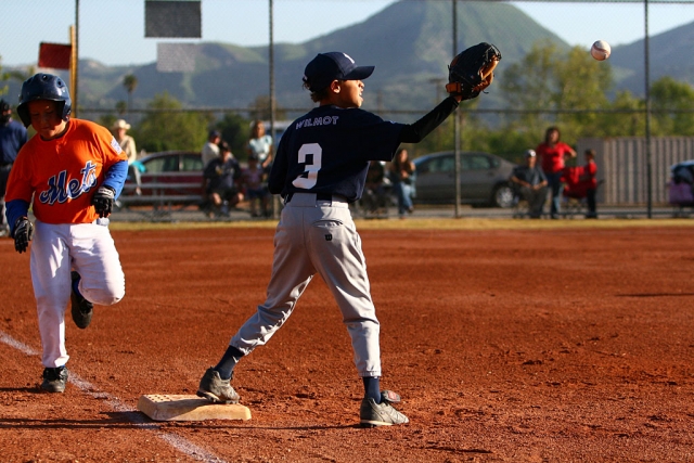 Matthew Wilmot gets the ball just in the nick of time for an out.