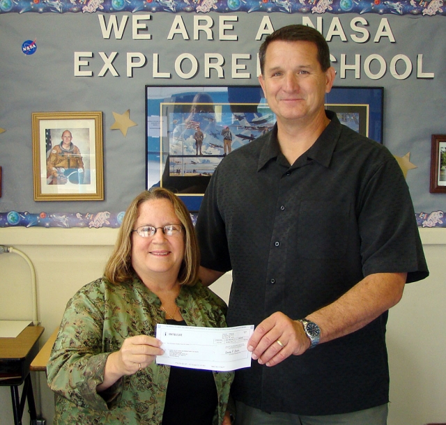 Randy Hale, Senior Station Manager of Fillmore Teleport represents INTELSAT is seen here presenting Jan Marholin, Principal of San Cayetano Elementary School a check for $500 for the NASA Robotics Program. “INTELSAT has satellites and is on the cutting of science and engineering. They have offered to partner with San Cayetano and have our students tour their facilities which is so supportive of our NASA Program. We appreciate their financial support of the robotics program which will be expanding to our 3rd grades this year”, states Principal Marholin. 