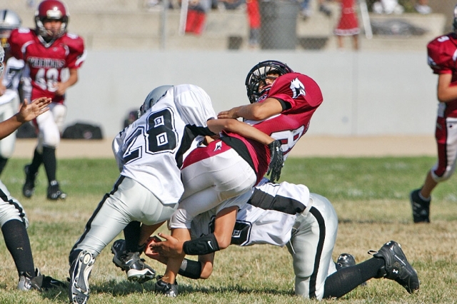 Freddy Hurtado making a big defensive stop assisted by unknown player.