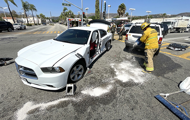 On Thursday, September 3, at approximately 1:45 p.m., the Fillmore Police Department, Fillmore City Fire Department, and AMR Paramedics were dispatched to a reported two vehicle collision at the intersection of Ventura Street and Central Avenue. Upon arrival, firefighters located a white Dodge and a Jeep SUV involved in the crash. The Dodge sustained significant damage to the driver’s side door, trapping the driver inside. Firefighters performed an extrication using hydraulic rescue tools (Jaws of Life) to safely remove the patient. The driver was transported by AMR Paramedics to a local hospital. The cause of the crash is under investigation. Photo credit Angel Esquivel.
