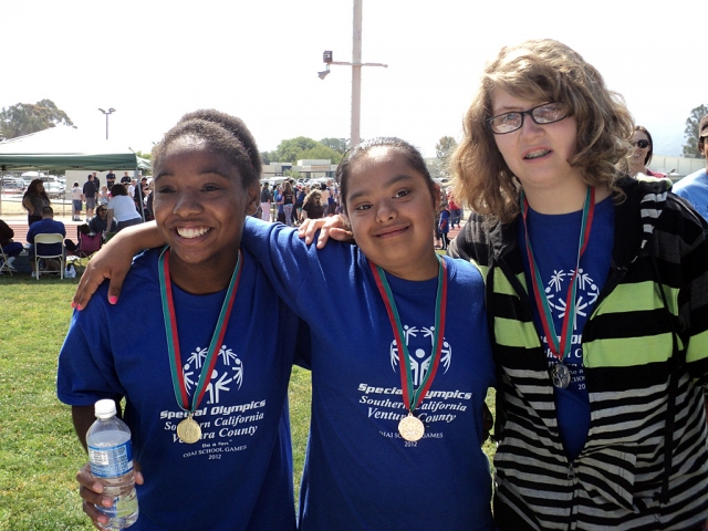 Jessica, Paola, and Jamie enjoying their win