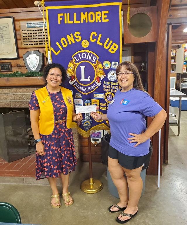 Lisa Morris, American West Coast Region representative for the Relay for Life, spoke to the Fillmore Lions Club Monday evening, August 15th, about the upcoming events and future area event plans. The next Relay for Life event will be in Oxnard on September 17th, 2022. For more information visit www.relayforlife.org/oxnardca. Pictured is Fillmore Lions Club Secretary Jaclyn Ibarra (left) presenting the yearly support check to ACS representative Lisa Morris. Photo Credit Fillmore Lions Club.
