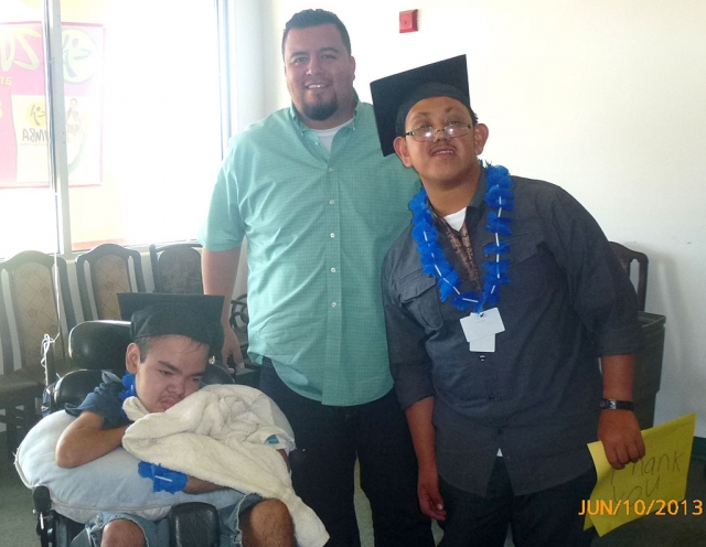 Chuy Jr. Ortiz, owner of El Pescador, with TEAMS graduates, Abel “Michael” Delgadillo and Leonardo Magana.