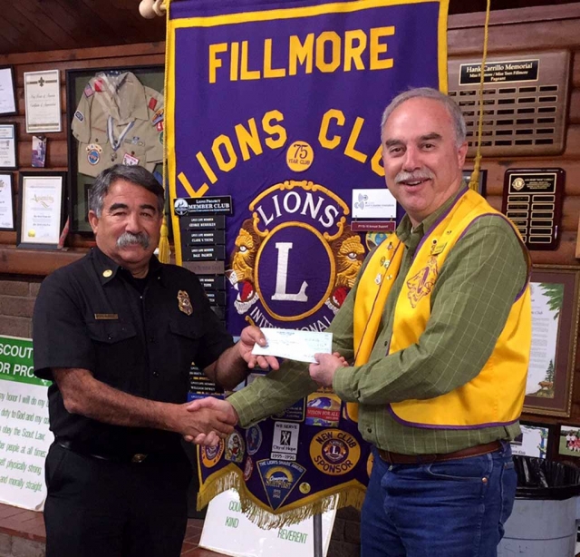 The Fillmore Lion’s Club has presented a check for $500 to the Fillmore Fire Foundation. Fire Chief Keith Gurrola accepted the check on behalf of the foundation from Lion’s Treasurer Brett Chandler. The Fillmore Volunteer Firefighters Foundation was formed in 2011 and is governed by a five member board of directors. Funding for the Foundation's goals comes from fund-raising, donations, and both public and private grants.