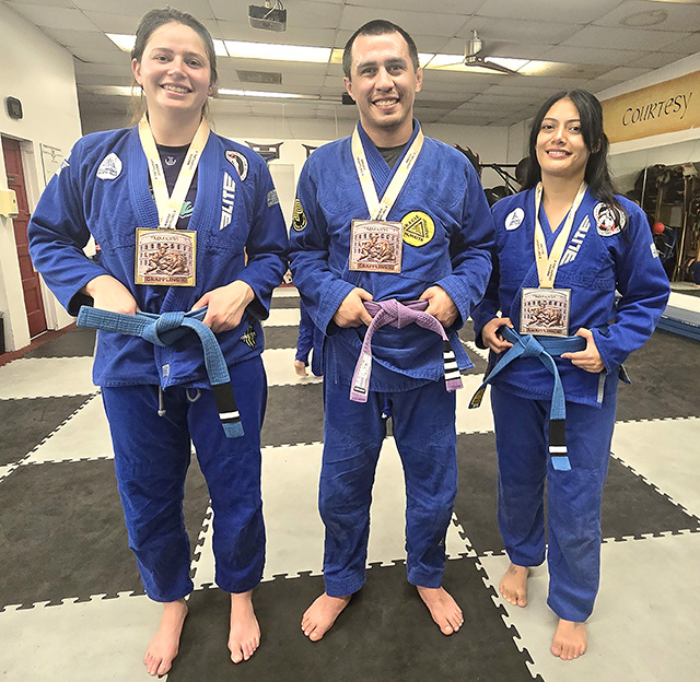 On Saturday, May 9, Brazilian Jiu-Jitsu competitors who train at Fillmore’s Perce’s Kenpo Karate Studio competed at the 2026 Grappling X West Coast Jiu-Jitsu Championships in Westlake and placed in multiple events. Pictured (l-r) is Emma Lopez who earned top spot in the 160 lb. female blue belt intermediate division, Matthew Ramirez for the adults earned a bronze in the highly competitive 165 lb. purple belt advanced division, and Dayana Ramirez earned silver in the 120 lb. female blue belt intermediate division. Photo credit Michael Torres.